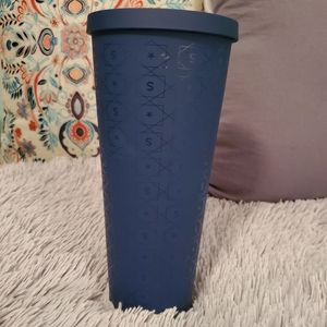 Starbucks plastic cup with lid.